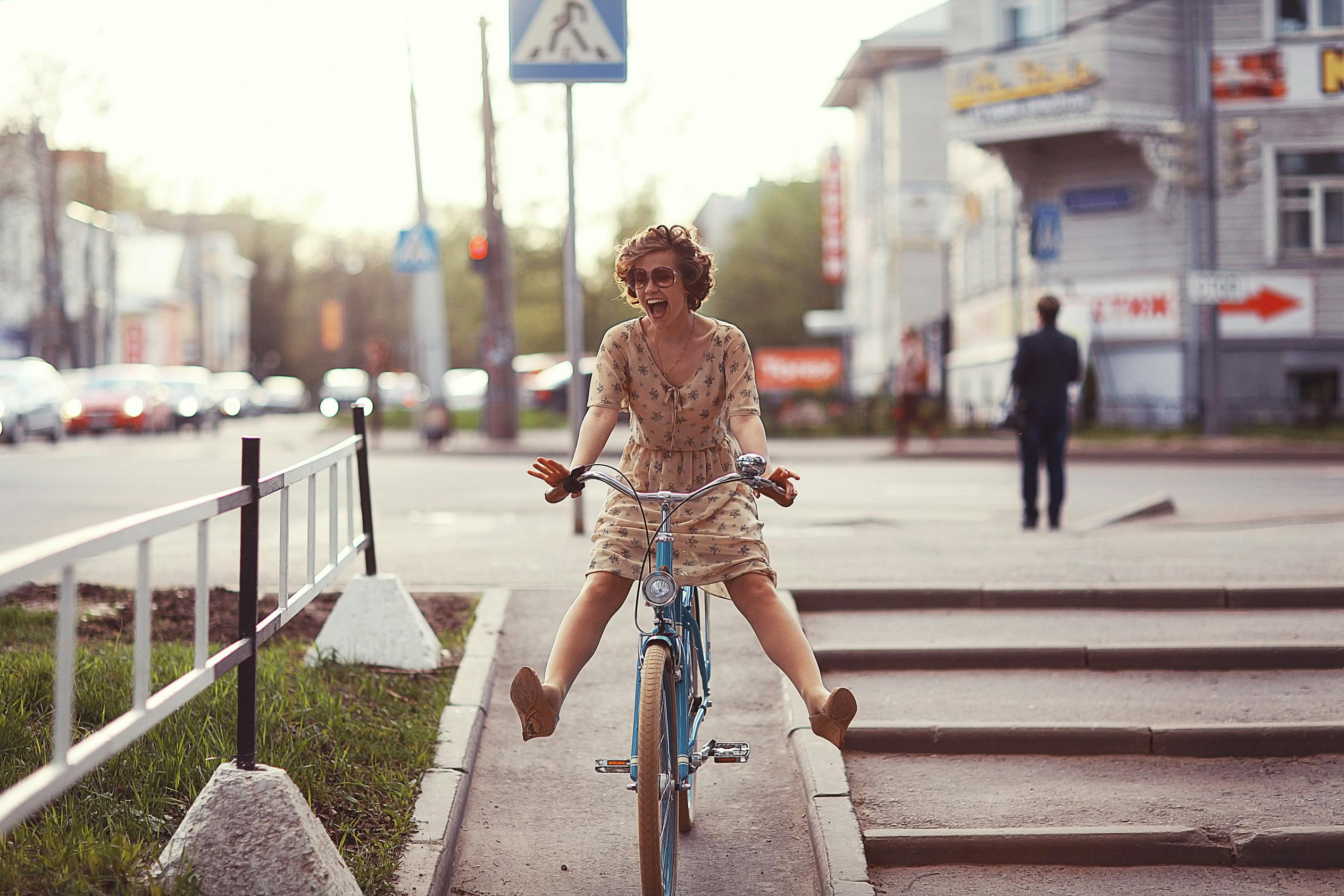 Smiling woman riding bike
